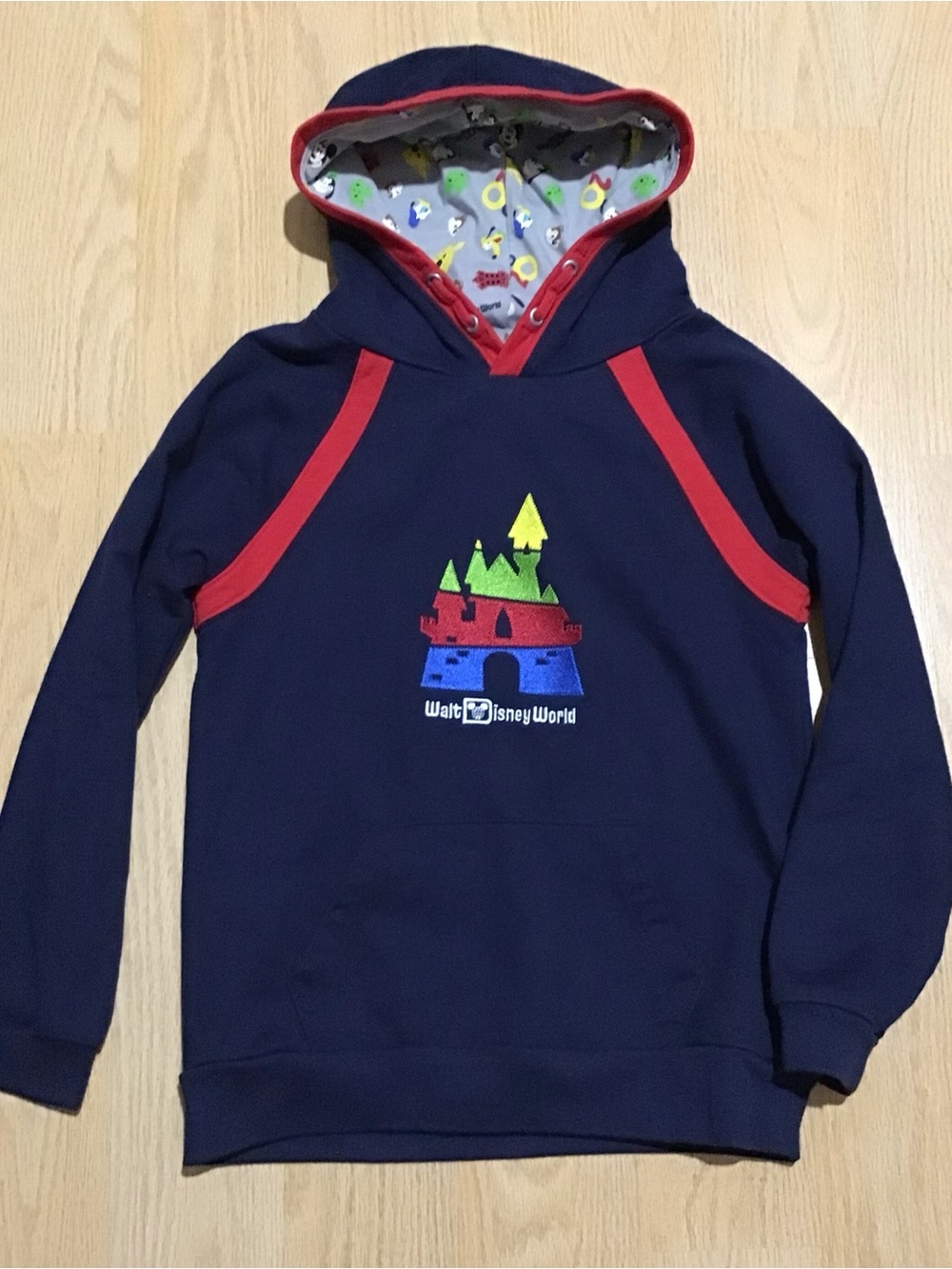 Disney Navy Hoodie with Red Trim and Colorful Castle Graphic